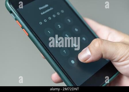 Hacking mobile phone with a password to access a smartphone, security threats online Phone lock code. Smartphone protection with 2fa Smartphone protec Stock Photo
