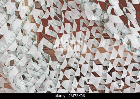 Winter camouflage netting for soldiers of the Ukrainian army Stock Photo