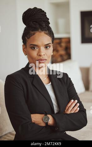 Portrait, black woman and leader arms crossed, manager and serious look in office. African American female, ceo or entrepreneur for business, employee Stock Photo