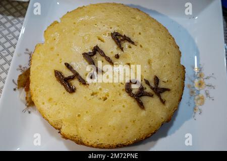 Tasty home made cake flavored with cinnamon and spices. Home made cake for happy anniversery ceremony. Stock Photo