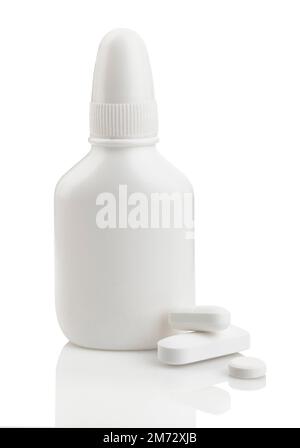 White blank nasal spray bottle and pills isolated on white background with clipping path Stock Photo