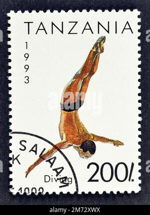 Cancelled postage stamp printed by Tanzania, that shows Diving, circa 1993. Stock Photo
