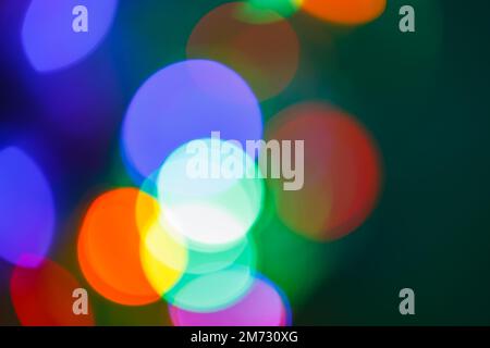 Abstract colorful bokeh background. Blurred colored highlights. Defocused Stock Photo
