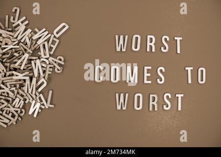 Worst Output Lettering WORST COMES TO WORST in wooden English language capital letters ...