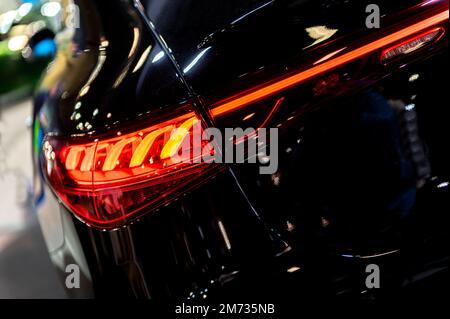 Modern backlights of the car. The headlight of modern prestigious car close-up. Beautiful headlights of a car. Stock Photo