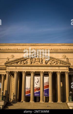 Sunlit neoclassical facade with Corinthian columns of the National Archives and Records Administration, Washington, D.C., USA Stock Photo