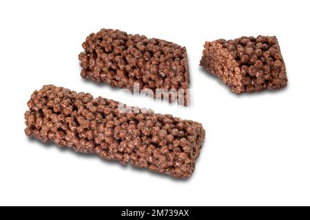 Snack bars with chocolate cereal, one whole and one cut up isolated on white, clipping path Stock Photo