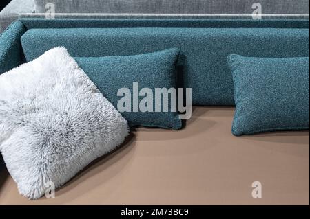Brown couch and gray pillows home decor Stock Photo