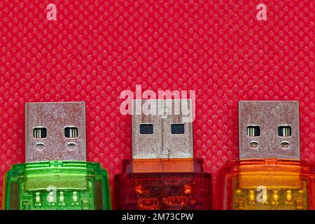 Close-up, cropped, Copyspace: Top view of three USB sticks side by side Stock Photo