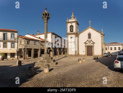 View of the pillory and church of São Pedro in the historic center of the city of Trancoso in Portugal. Stock Photo