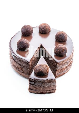 Tasty  chocolate cake decorated with truffle isolated on white Stock Photo
