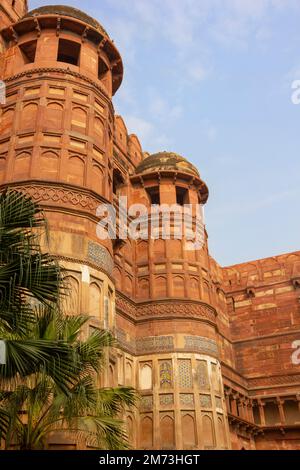 Amar Singh Gate at historical Red Fort in Agra India showing curved towers fine carving architecture and red sandstone colour as the building material Stock Photo