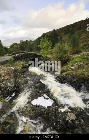 Autumn view over Ashness Bridge, Keswick town, Lake District National Park, Cumbria, England, UK Stock Photo