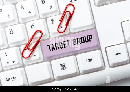 Hand writing sign Target Group. Word for Particular showing that an advertisement intended to reach to Stock Photo
