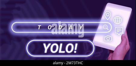 Sign displaying Yolo. Word Written on stand for You only live once popular phase among students and teens Stock Photo