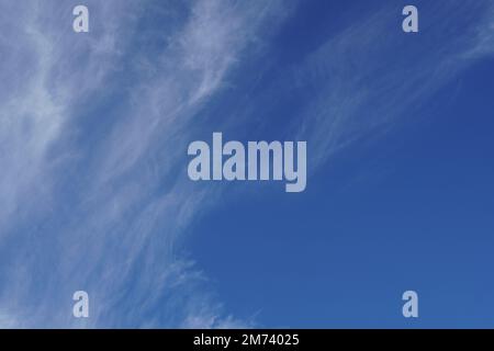 Cirrus white clouds on blue sky Stock Photo