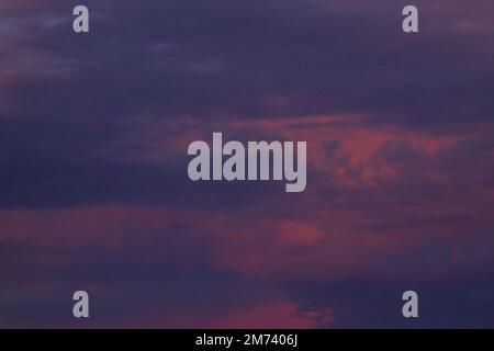Colorful fine clouds on the sky at sunset Stock Photo