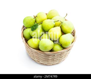 Juicy  yellow pears in basket isolated on white Stock Photo