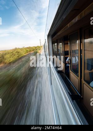view of tracks from moving train window Stock Photo - Alamy