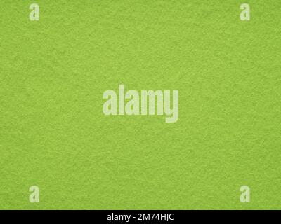 Texture of lime or bright green felt close-up. Handicraft concept, crafts, DIY, do it yourself. Top view, flat lay, layout, place for text. For shops Stock Photo