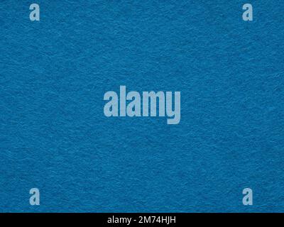 Dark contrast blue, soft turquoise felt texture background. Surface of felted fabric material closeup, on macro. Pattern for text, lettering Stock Photo