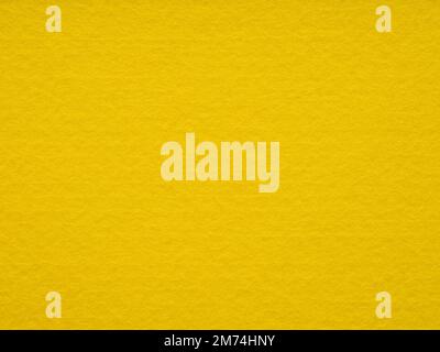 Texture of yellow, felt close-up. Handicraft concept, crafts, DIY, do it yourself. Top view, flat lay, layout, place for text. For shops with goods Stock Photo