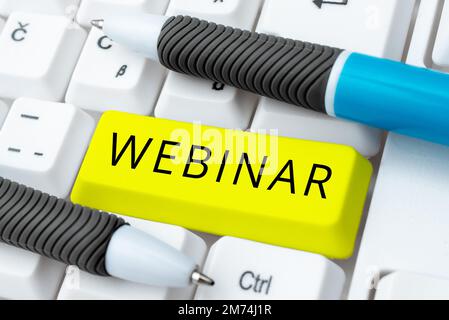 Sign displaying Webinar. Internet Concept defined as seminar conducted over the Internet Web conferencing Stock Photo