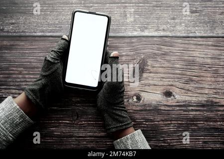 hacker hand stealing data from smart phone  Stock Photo