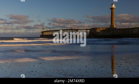 A long exposure shot of the North Pier and North Sea at Whitby Stock Photo