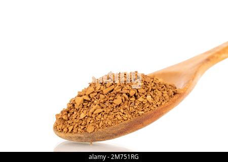 Fragrant instant coffee with wooden spoon, macro, isolated on white background. Stock Photo