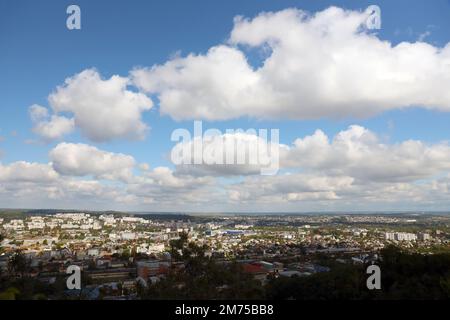 LVIV, UKRAINE - SEPTEMBER 11, 2022 Panorama view of the historical old city in Lviv, Ukraine. Many old buildings with metal roofs and cathedral domes in beginning of autumn day Stock Photo