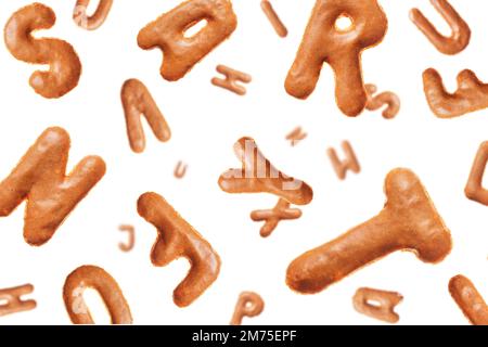 Chaotic flying letters made of real cookies, isolated on white background, closeup Stock Photo