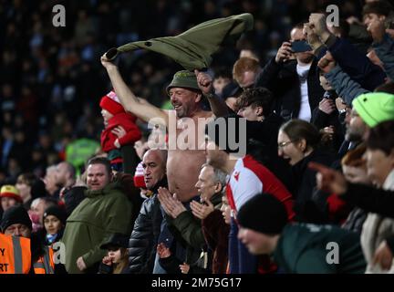 Coventry, UK. 7th Jan, 2023. Wrexham fans celebrate the win during the The FA Cup match at the Coventry Building Society Arena, Coventry. Picture credit should read: Darren Staples/Sportimage Credit: Sportimage/Alamy Live News Stock Photo
