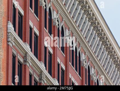 44 massive terra cotta brackets frame the top story windows and support the Electric Building’s elaborate cornice. Stock Photo
