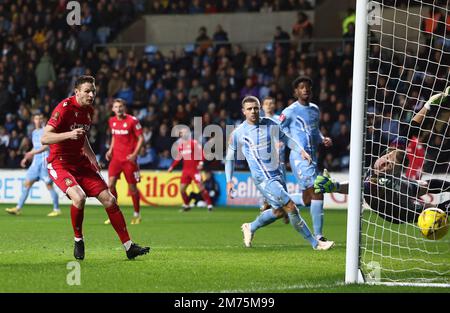 Coventry, UK. 7th Jan, 2023. Elliot Lee of Wrexham (hidden) scores their second goal past Simon Moore of Coventry City during the The FA Cup match at the Coventry Building Society Arena, Coventry. Picture credit should read: Darren Staples/Sportimage Credit: Sportimage/Alamy Live News Stock Photo