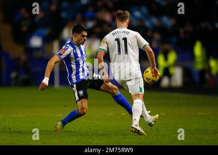 Sheffield, UK. 07th Jan, 2023. Reece James #33 of Sheffield Wednesday and Matt Ritchie #11 of Newcastle Unitedduring the Emirates FA Cup Third Round match Sheffield Wednesday vs Newcastle United at Hillsborough, Sheffield, United Kingdom, 7th January 2023 (Photo by Ben Early/News Images) in Sheffield, United Kingdom on 1/7/2023. (Photo by Ben Early/News Images/Sipa USA) Credit: Sipa USA/Alamy Live News Stock Photo