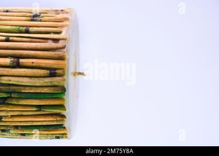 bamboo candle for peace and calm zen mood white background Stock Photo