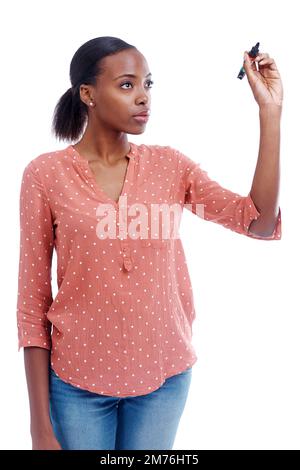 Time to concentrate. an attractive young woman holding a marker. Stock Photo