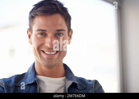 In just the right job. Cropped portrait of a confident, casually-dressed young businessman. Stock Photo