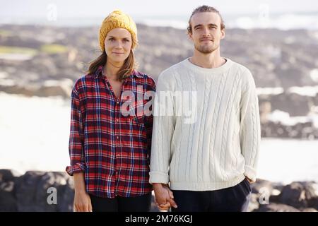 Spending precious time together. Portrait of an affectionate young couple spending time together outdoors. Stock Photo