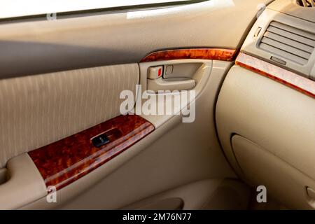 Car door handle closeup view from inside the car Stock Photo