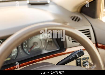Car head lamp handle with left and right turn signal controller Stock Photo