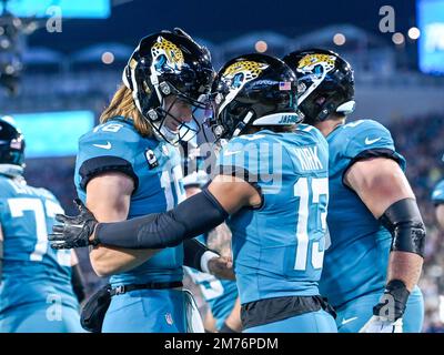 Jacksonville, Florida, USA. January 7, 2023: Jacksonville Jaguars wide  receiver JAMAL AGNEW (39) gets tackled after returning the ball during the Jacksonville  Jaguars vs Tennessee Titans NFL game at TIAA Bank Field