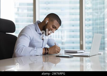African man studying online take part in educational seminar Stock Photo