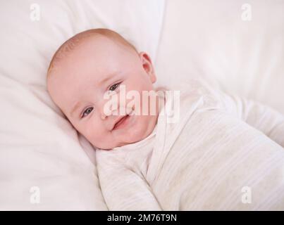Learning and growing everyday. a cute and adorable baby boy at home. Stock Photo