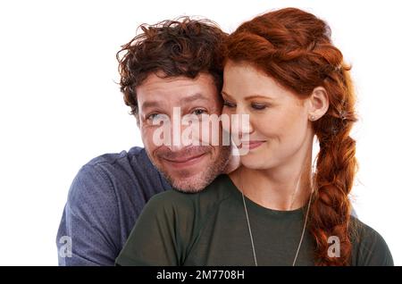 Im so glad I found her. Studio portrait of a happy young couple on a white background. Stock Photo