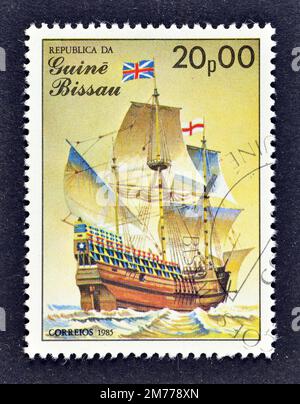 Cancelled postage stamp printed by Guinea Bissau, that shows Mayflower sailing ship, 17th century, circa 1985. Stock Photo