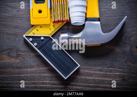 Collection of construction objects for maintenance works on vintage wooden board architecture and building concept. Stock Photo