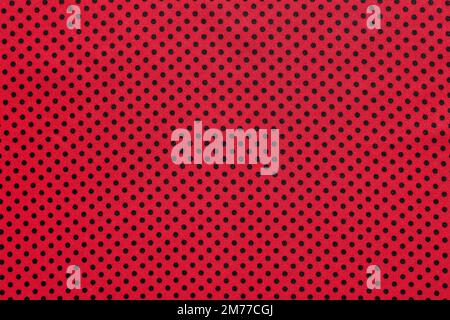 Pink polka-dot cotton table cloth. Stock Photo