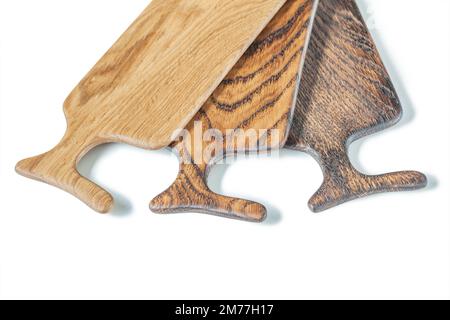 three small seving board isolated on white very close up Stock Photo